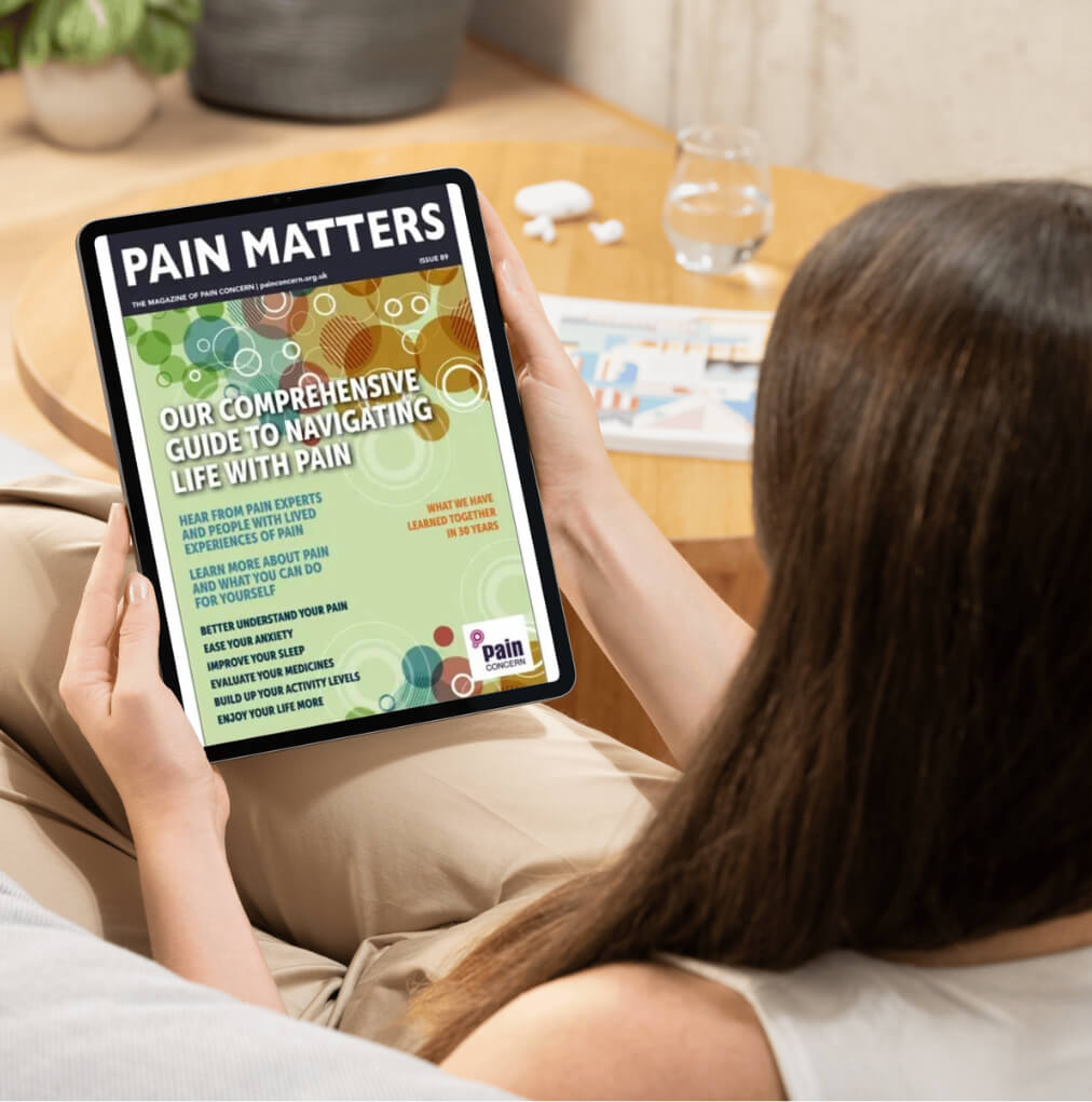 Woman reading Pain Matters on tablet